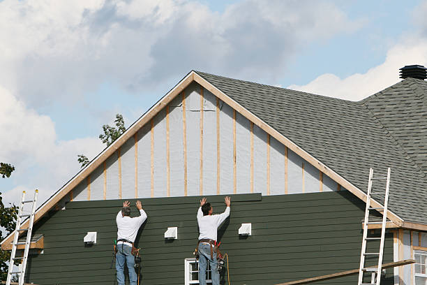 Professional Siding technician working in Covington, KY